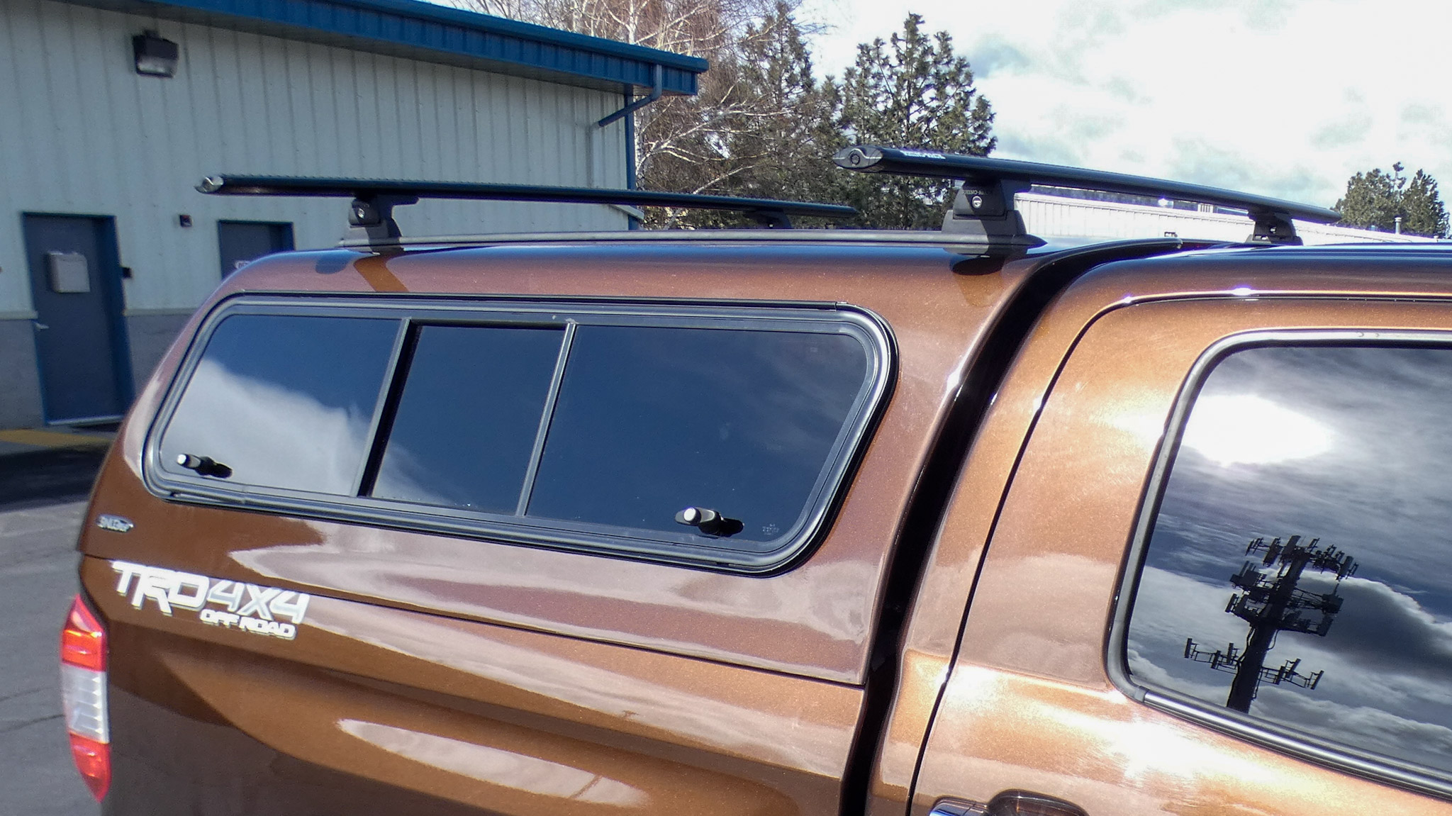 2021 Toyota Tundra - Base Rack System on Snugtop Canopy - Rhino Rack