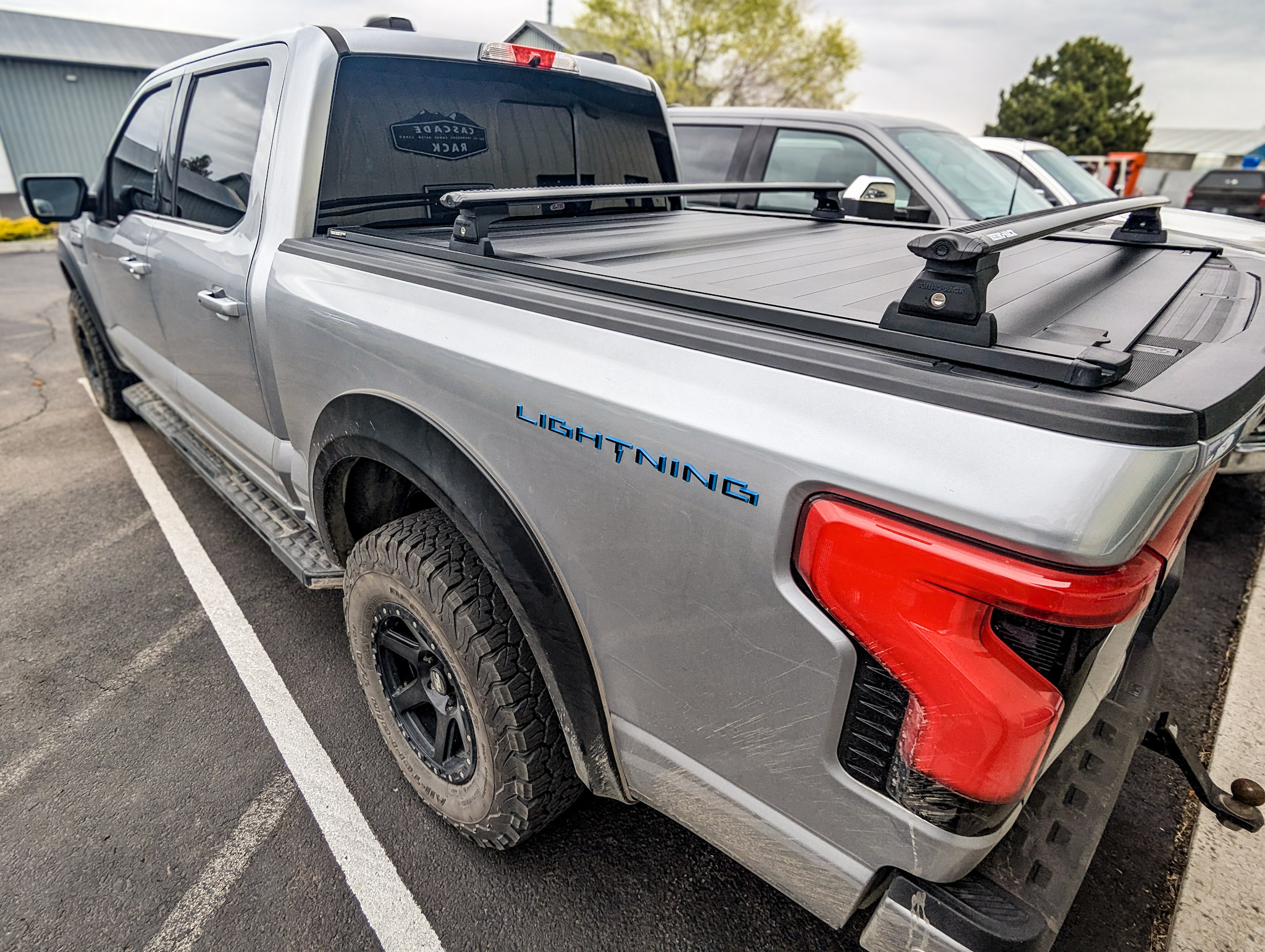 2023 Ford F-150 - Tonneau Cover and Crossbars -  RetraxPRO XR Retractable Tonneau Cover and RhinoRack Crossbars
