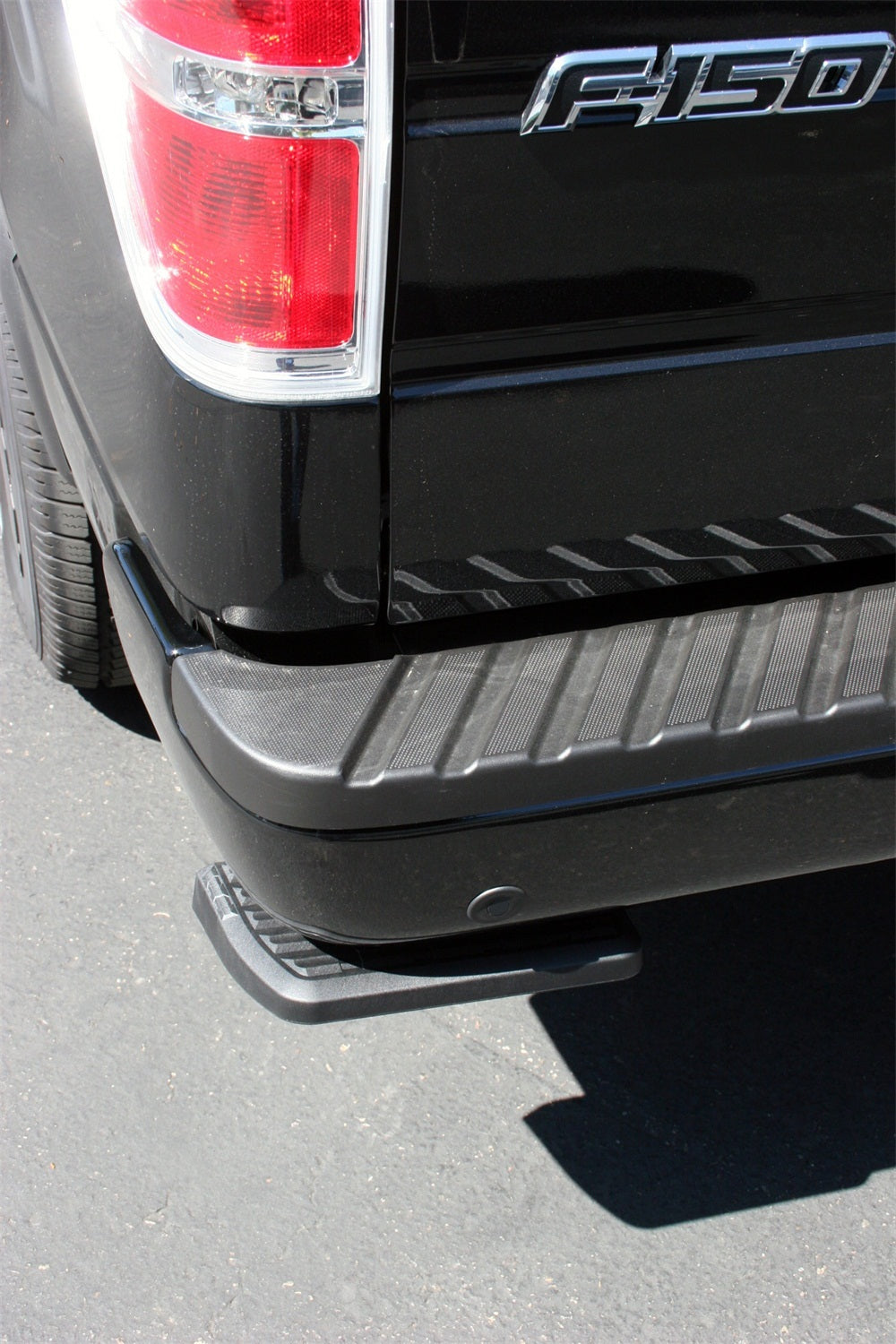AMP Research 75302-01A Bedstep Flp Dwn Bmpr Stp 06-14 Ford F-150, Incl. Raptor (Excl Flareside)