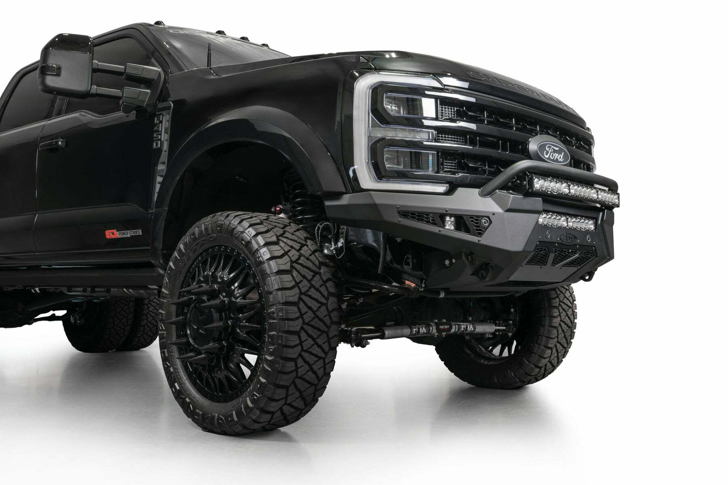 Addictive Desert Designs - 2023-2025 Ford Super Duty HoneyBadger Front Bumper w/ Top Hoop - F810221770103
