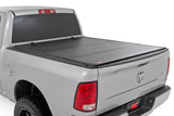 Rough Country - Hard Tri-Fold Flip Up Bed Cover - 5'7" Bed - Ram 1500 (09-18) - 49319550